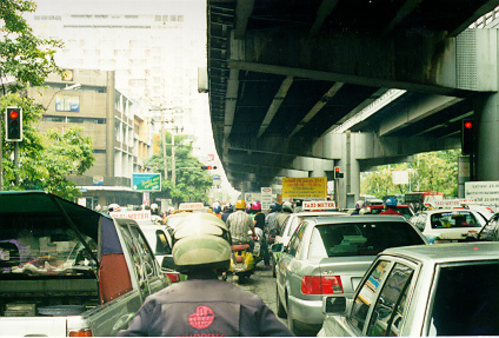 A view from the back of a motorcycle taxi