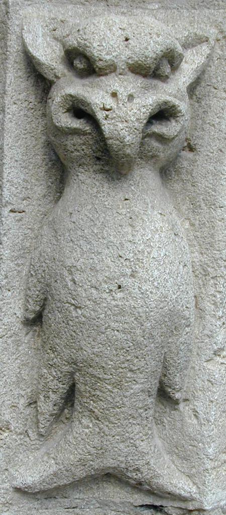 A figure from the carved doorway