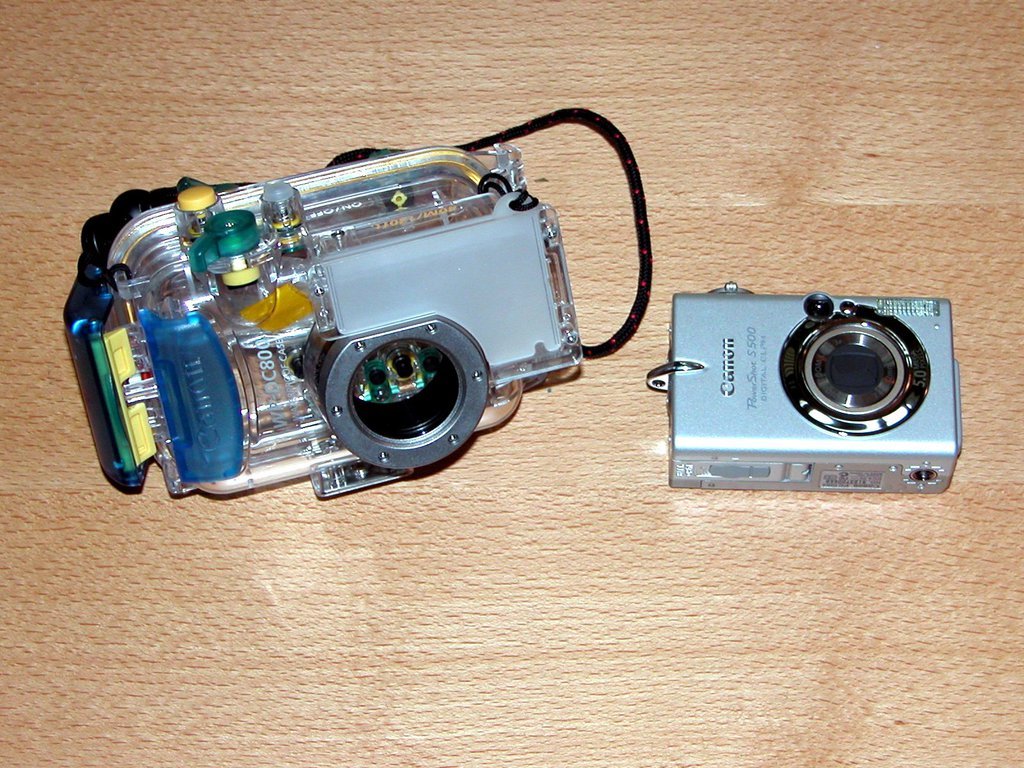 Camera and under-water housing
