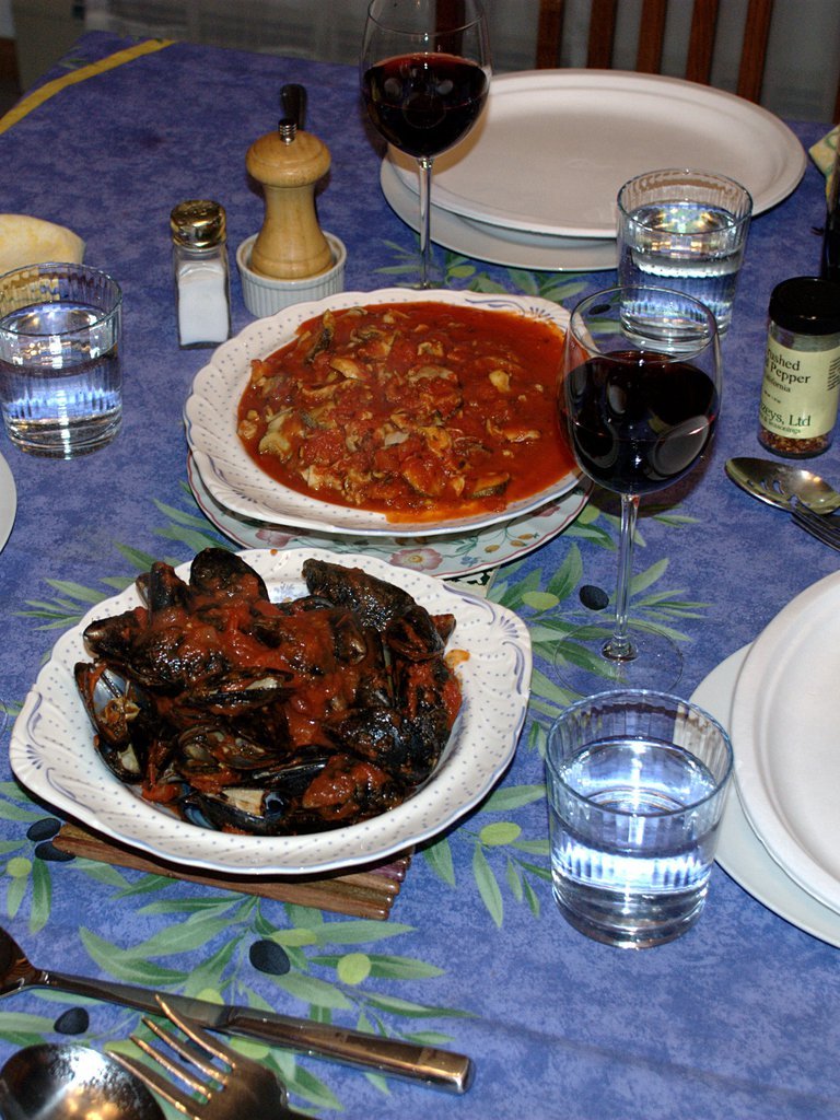 Mussels and scungilli fra diavolo (fifth and sixth courses)