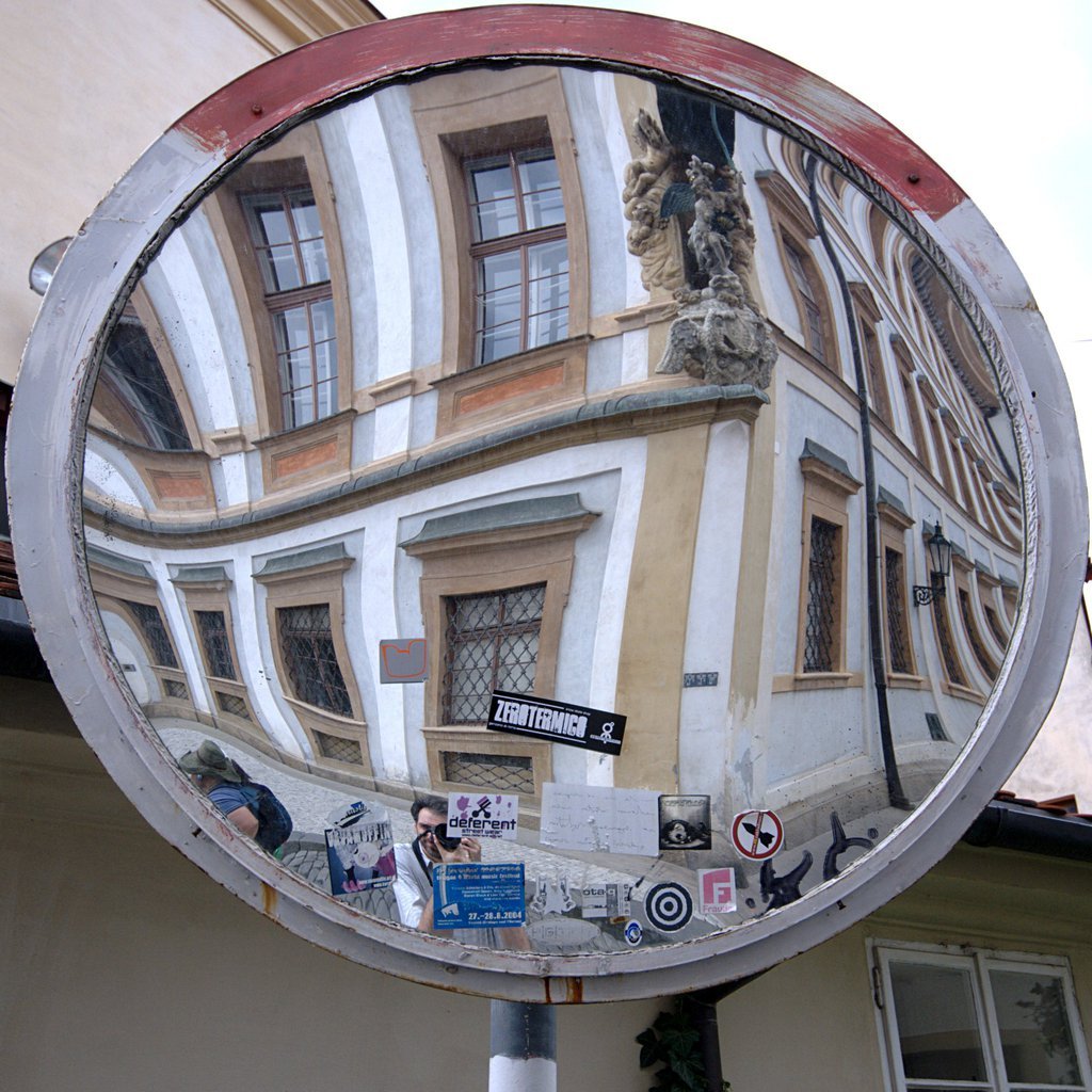 Traffic mirror, graffiti, self portrait