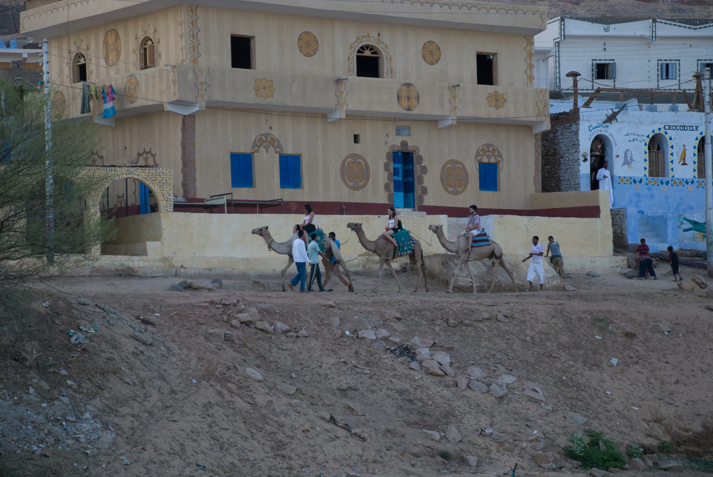 Tourist camel riders in a Nubian village