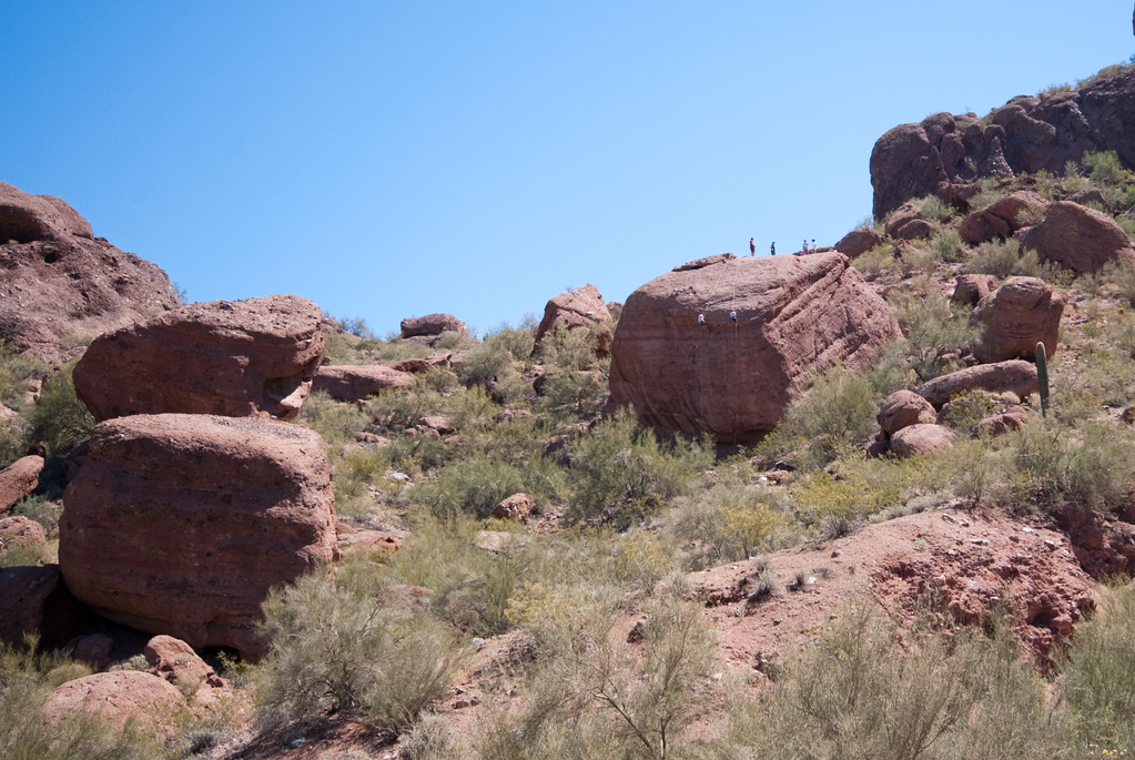 Climbers on a small rock