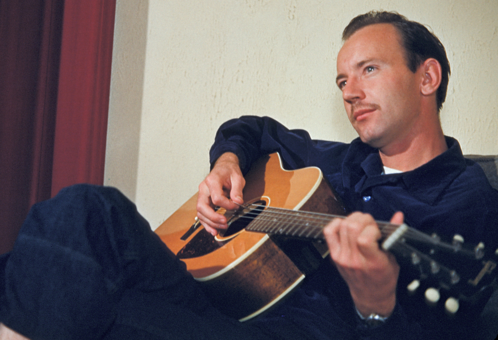 Playing guitar