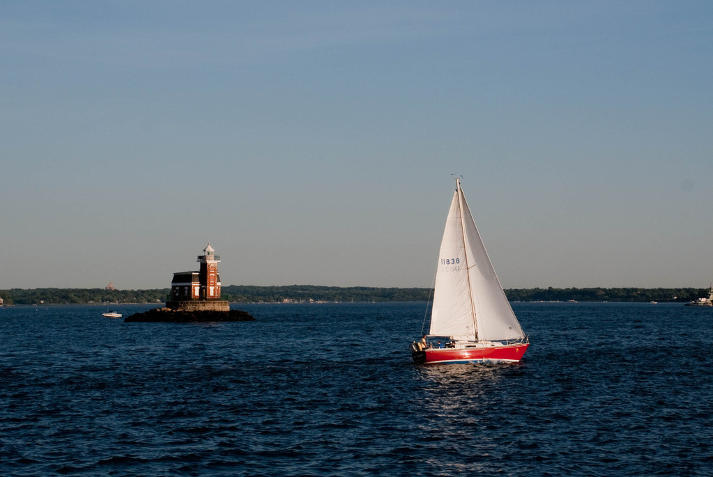 Sailboat and lighthouse Sailboat and lighthouse